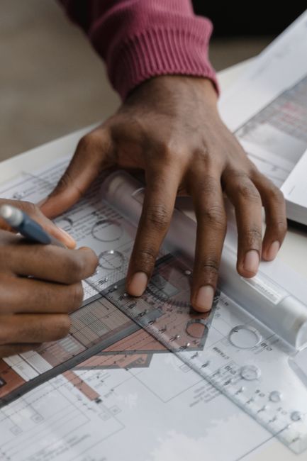 hand drawing floor plan on graph paper