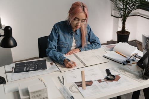 A Woman Holding a Pen