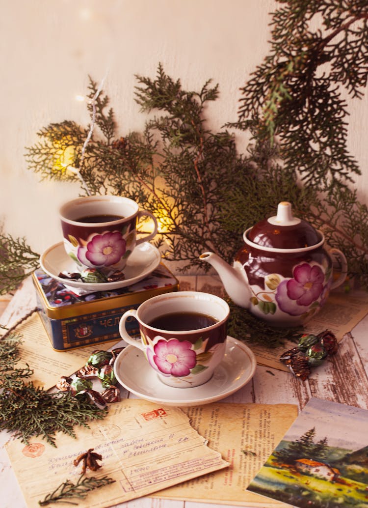 Vintage Coffee Cups And A Pot 