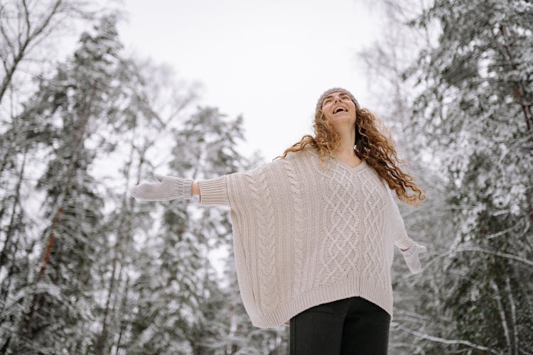 Happy Woman In A Forest In Winter