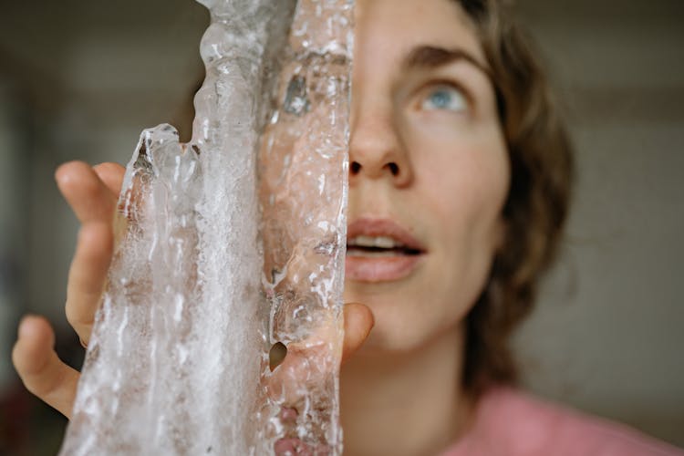 Woman With Icicle In Hands