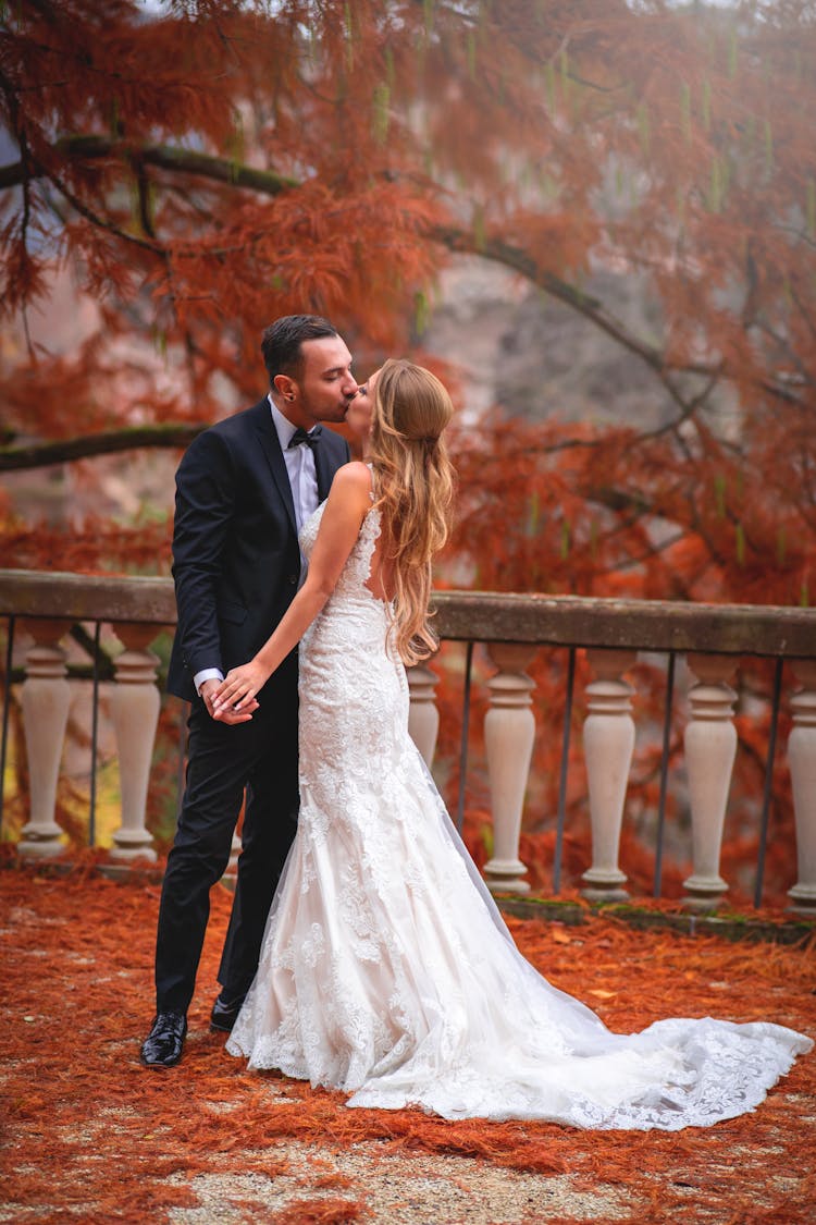 Bride And Groom Kissing