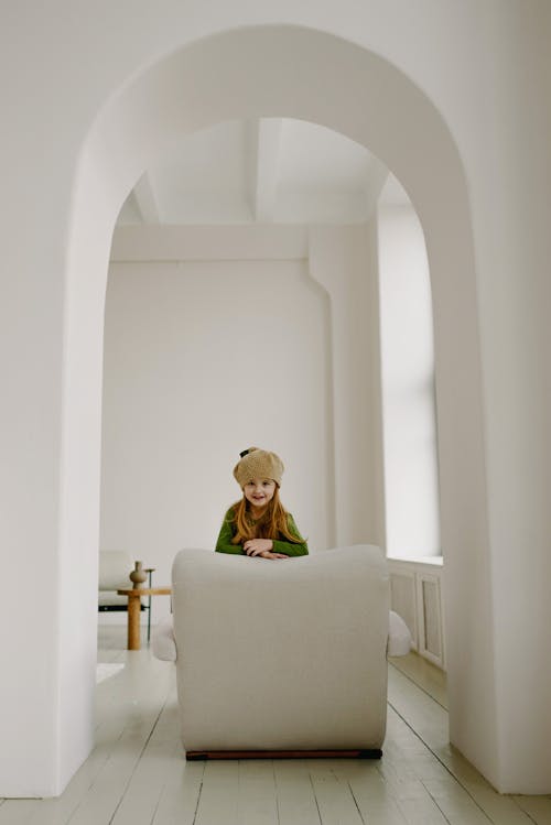 Girl on a Chair Under an Archway