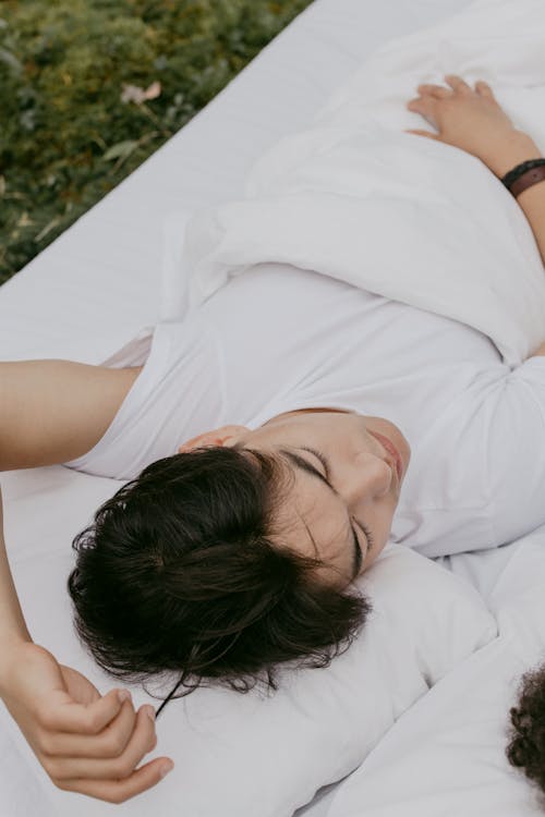 A Man Lying Down in a Sleeping Bag