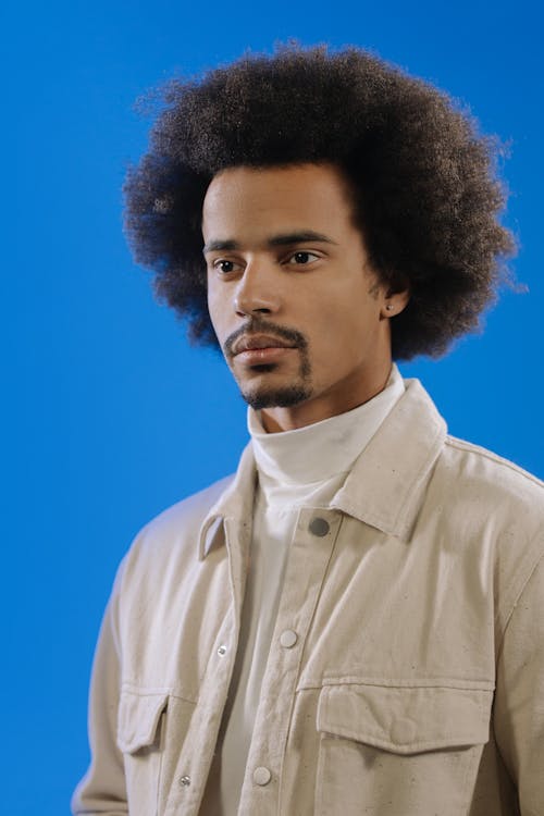 
A Man with Goatee and an Afro Hairstyle