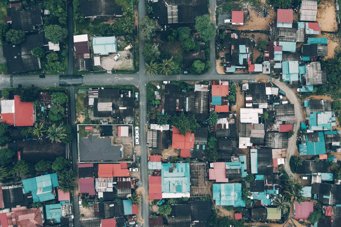 residential neighborhood community street with local businesses
