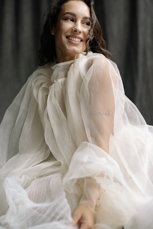 Portrait of Smiling Brunette in Tulle Dress