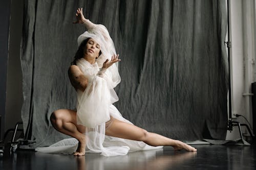 Elegant Woman Dancing in Studio