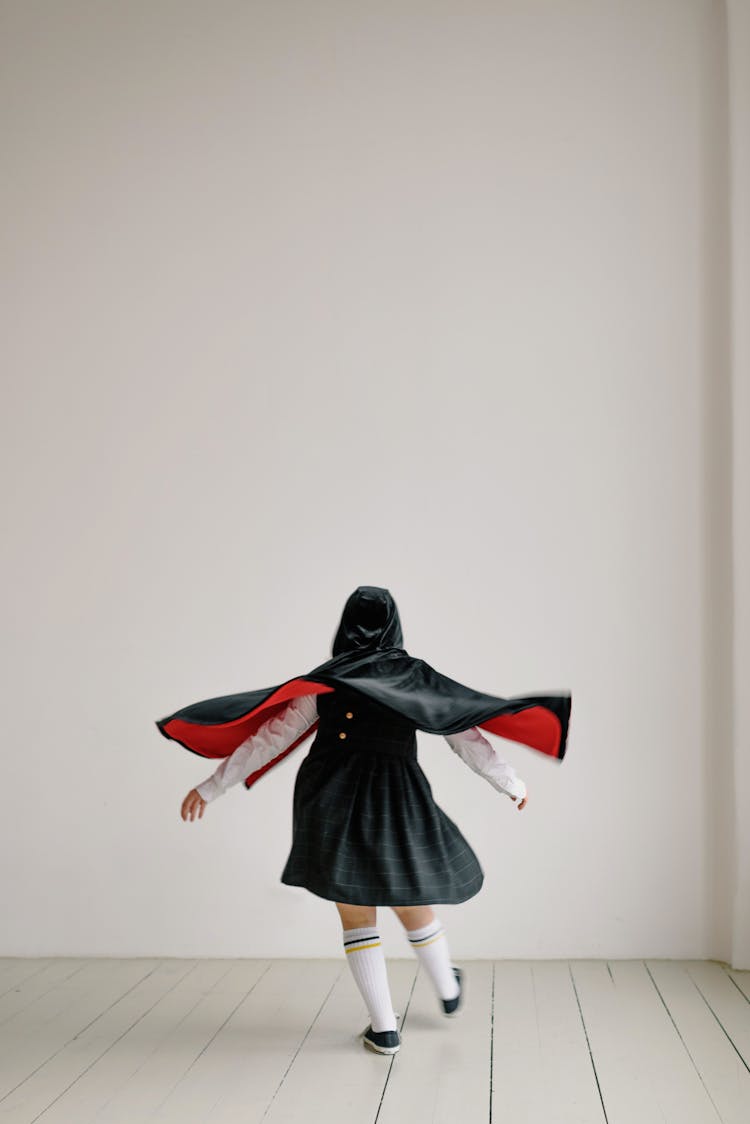 A Girl In A Black Cloak