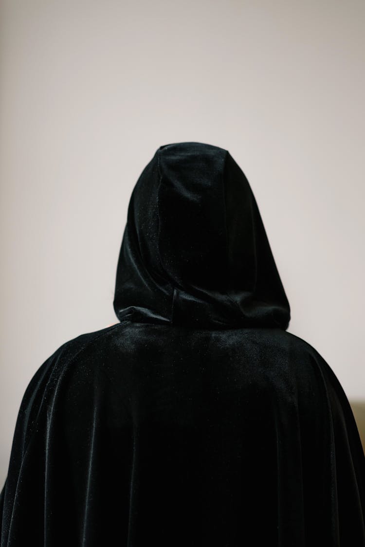 Person In Black Cloak