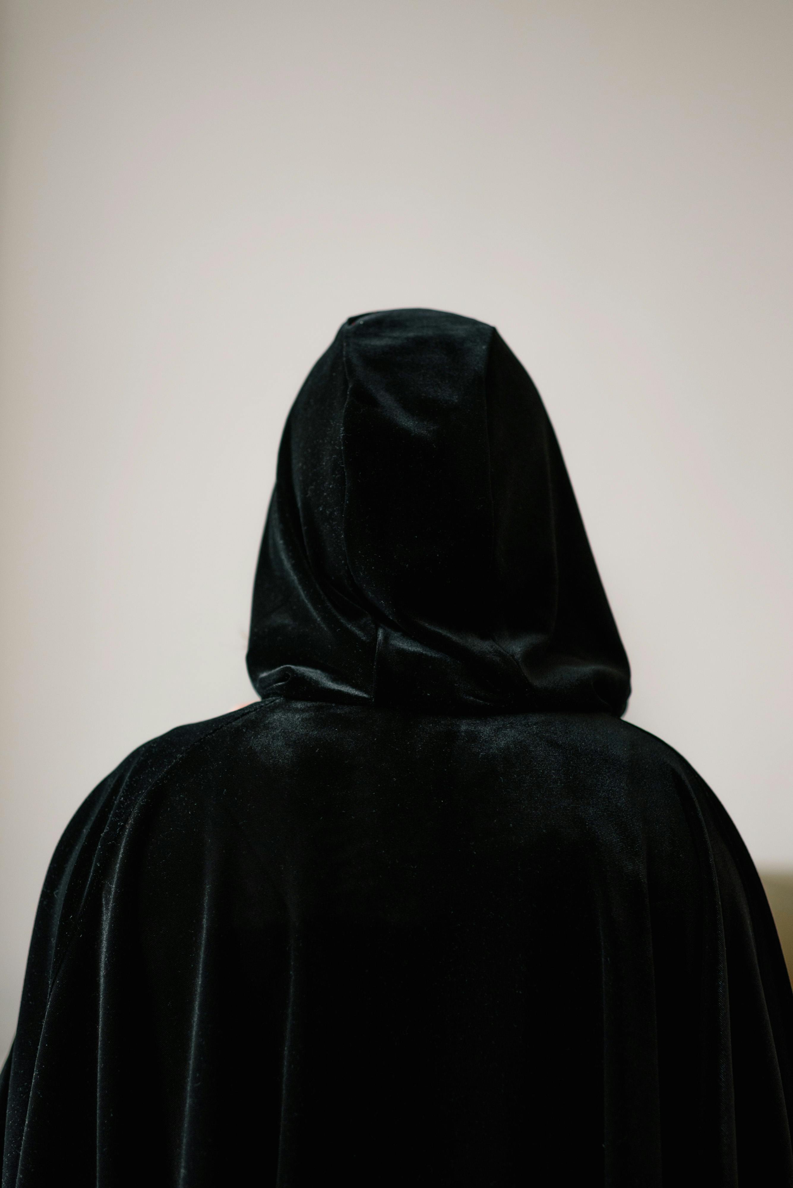 Person in Black Cloak · Free Stock Photo