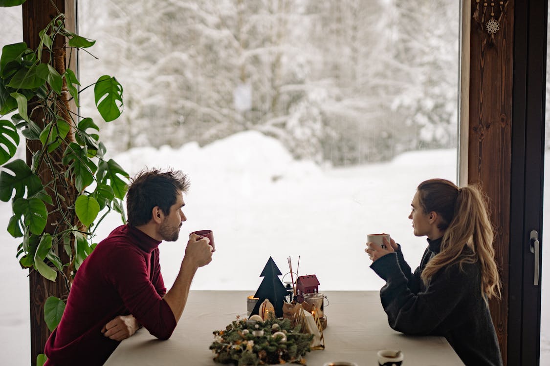 A Couple Drinking Coffee on a Cold Winter