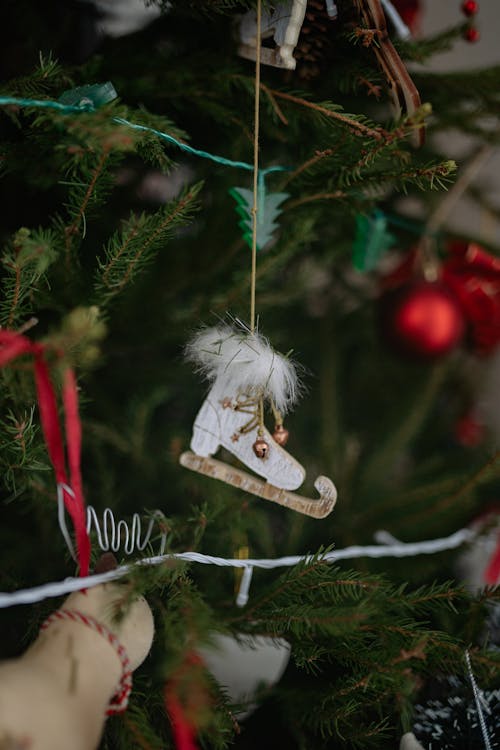 Free A Hanging Christmas Ornament on a Christmas Tree Stock Photo