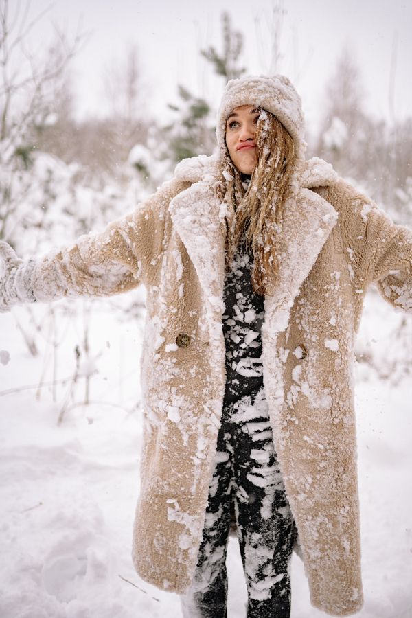 Woman in shearling jacket and jeans