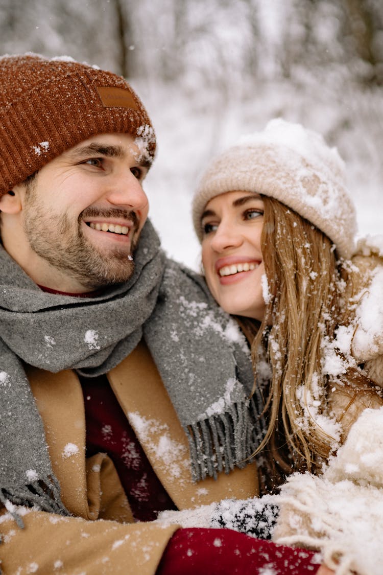 A Happy Couple In Winter Clothes