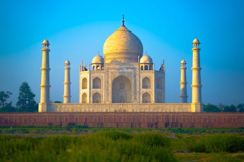 Amazing Taj Mahal Mausoleum under Blue Sky 