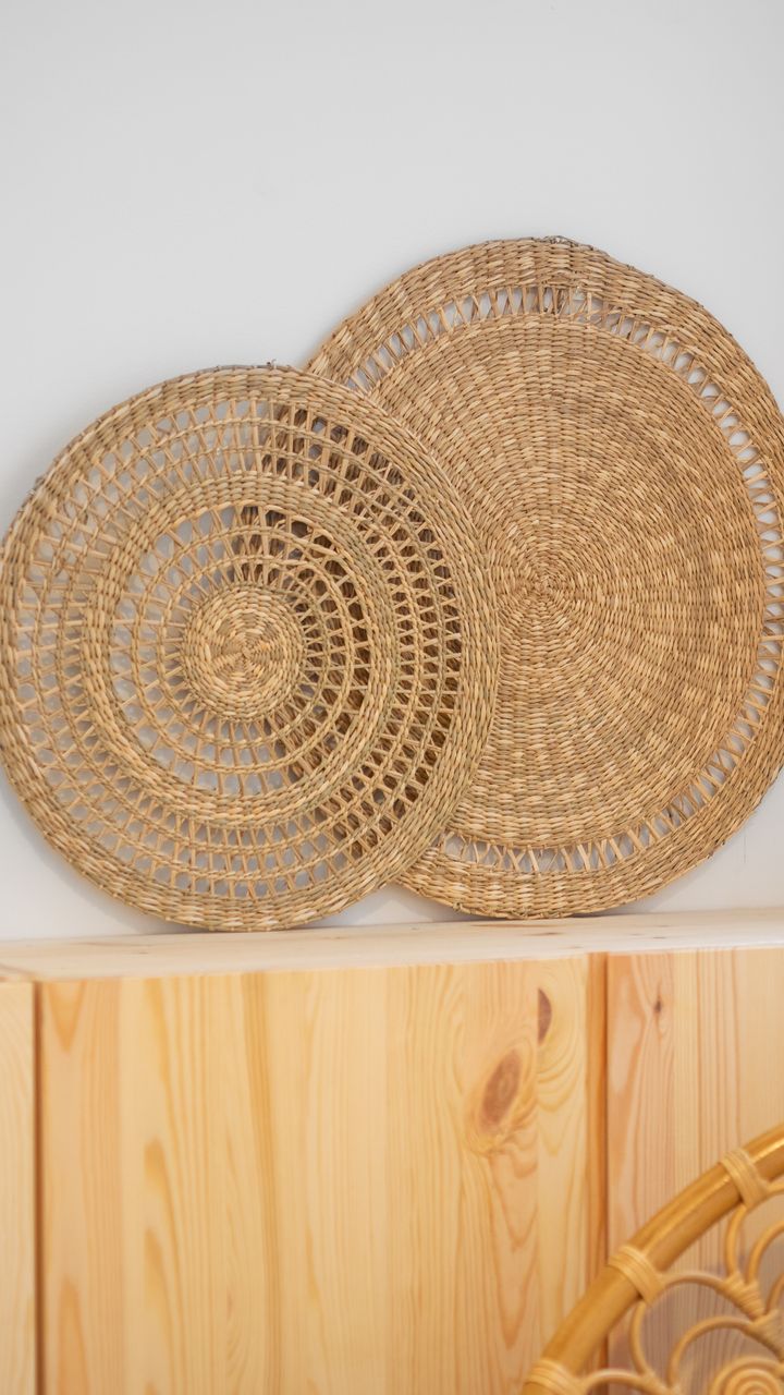 Ceramic trivet placed on the top shelf of a coffee bar hutch