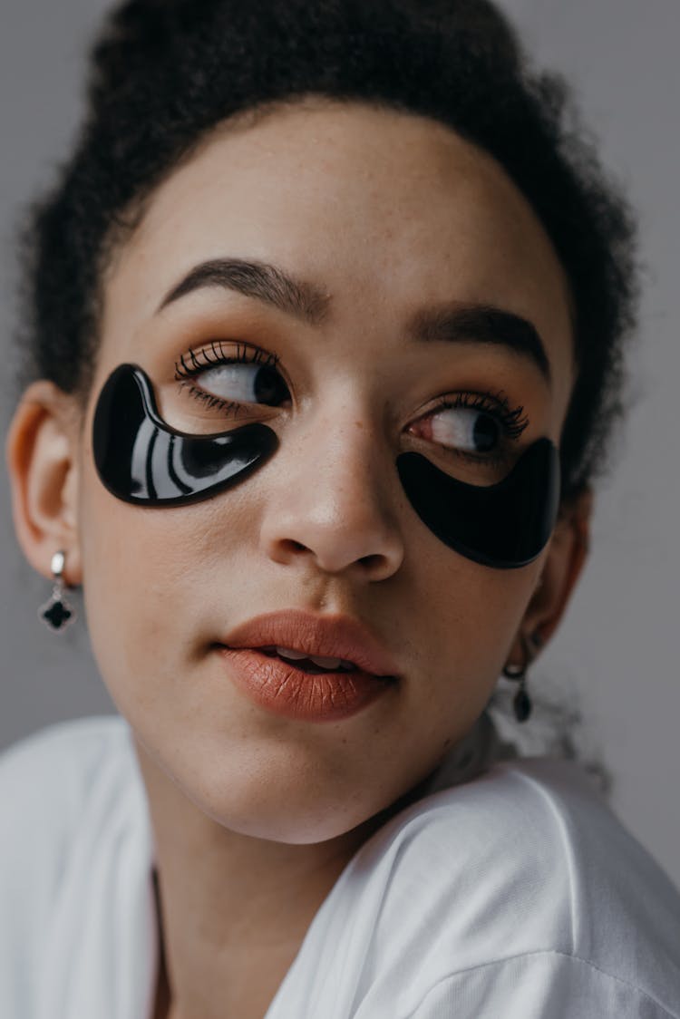 Close-Up Shot Of A Woman With Under Eye Masks