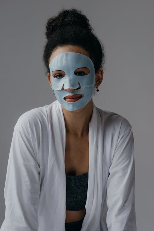 Woman with Facial Mask while Looking at Camera