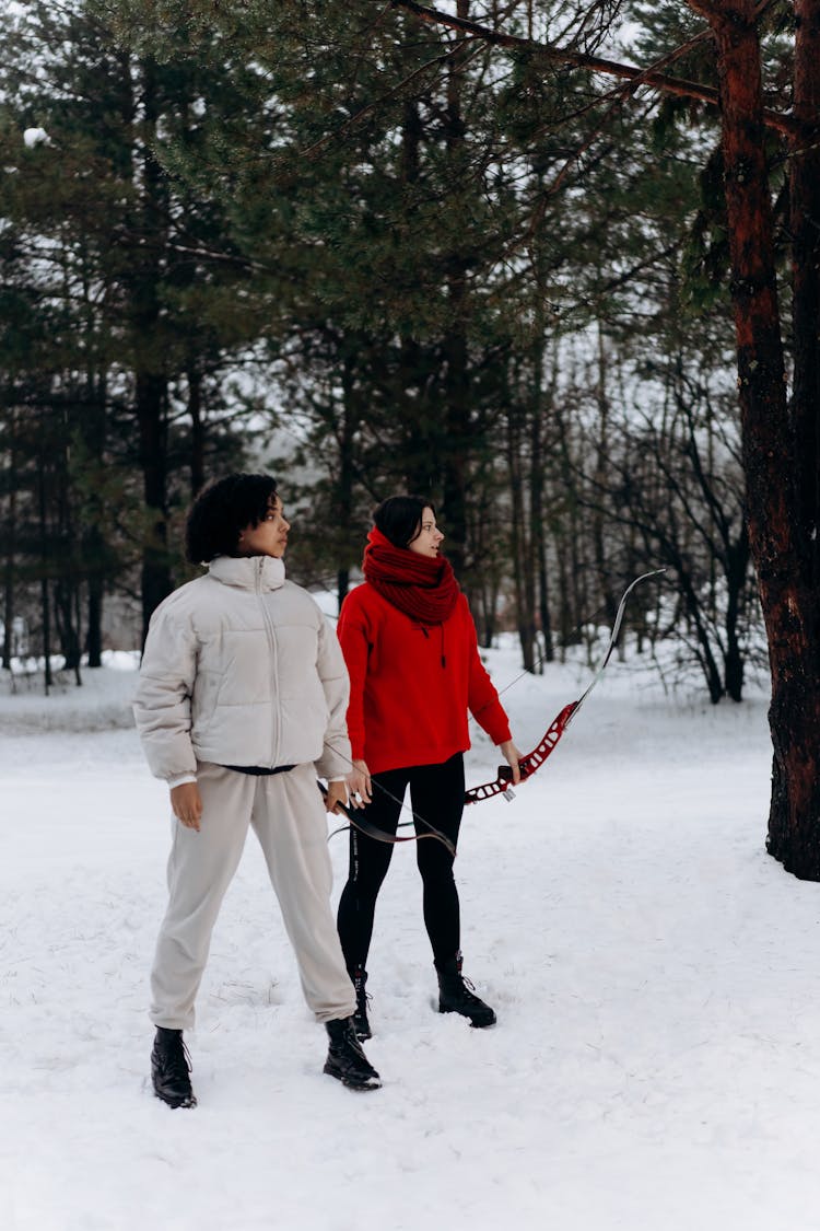 Women Practicing Archery Together