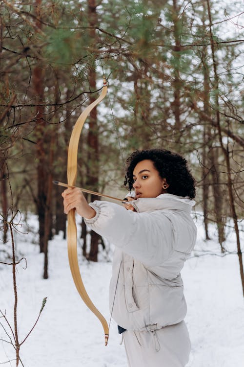 Pretty Woman Shooting an Arrow