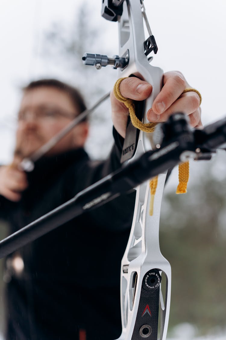 Man Aiming Using A Recurve Bow