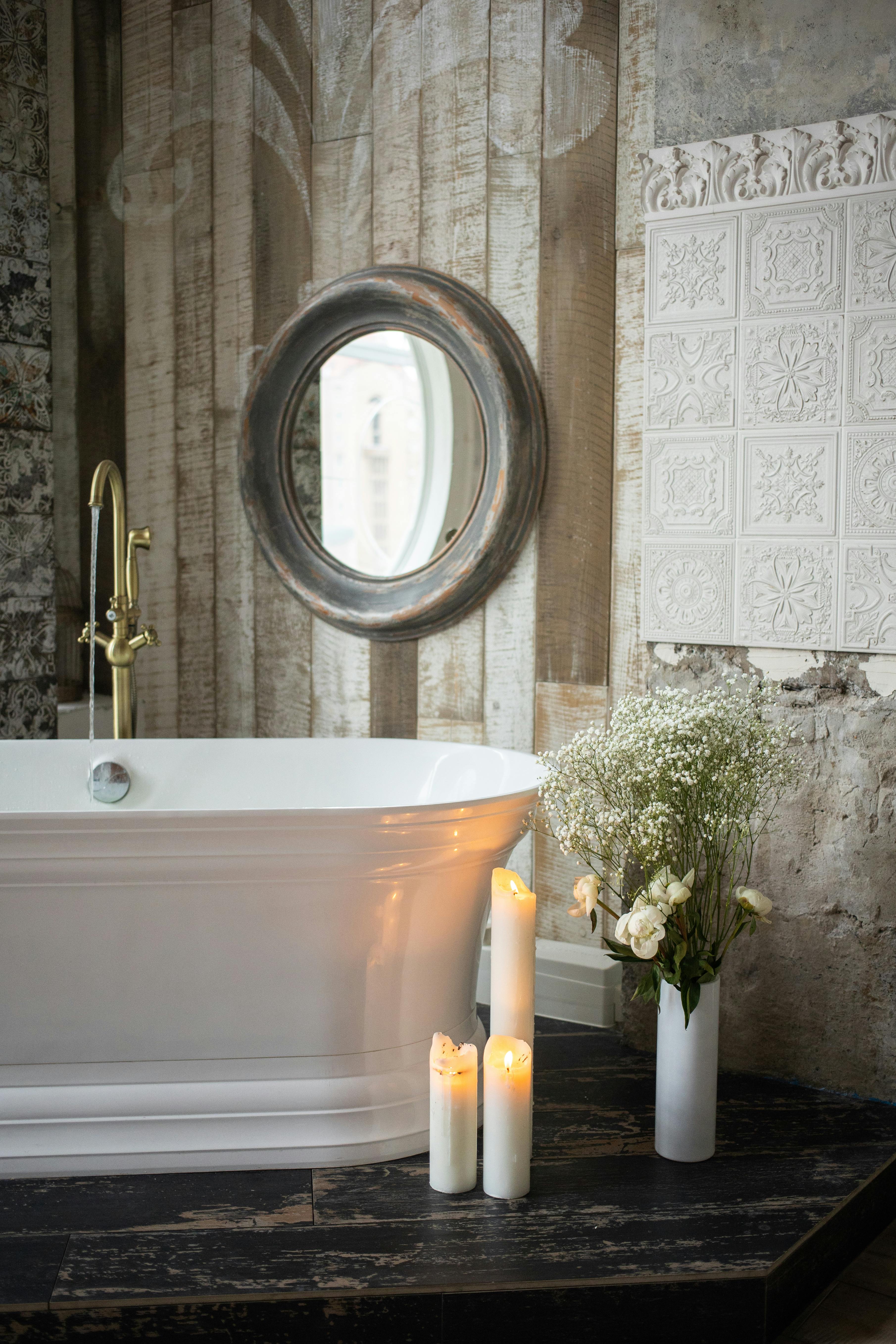 modern bath near burning candles