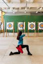 Archer Aiming on a Target