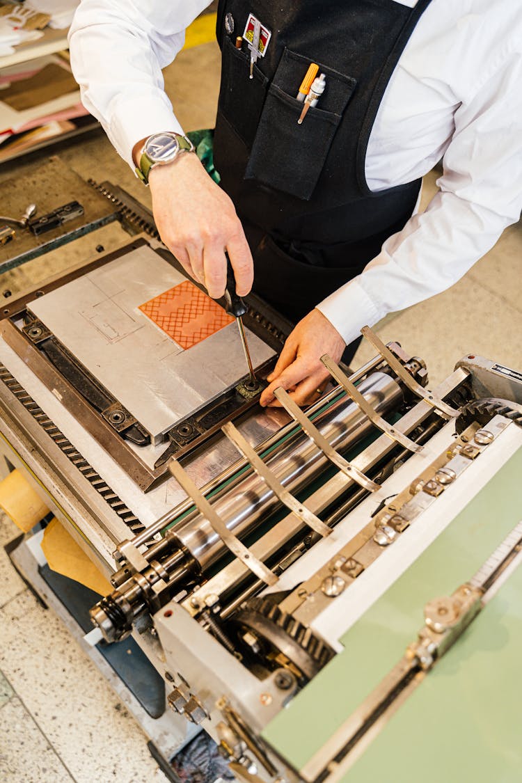 Man Working On A Clay Slab Press 