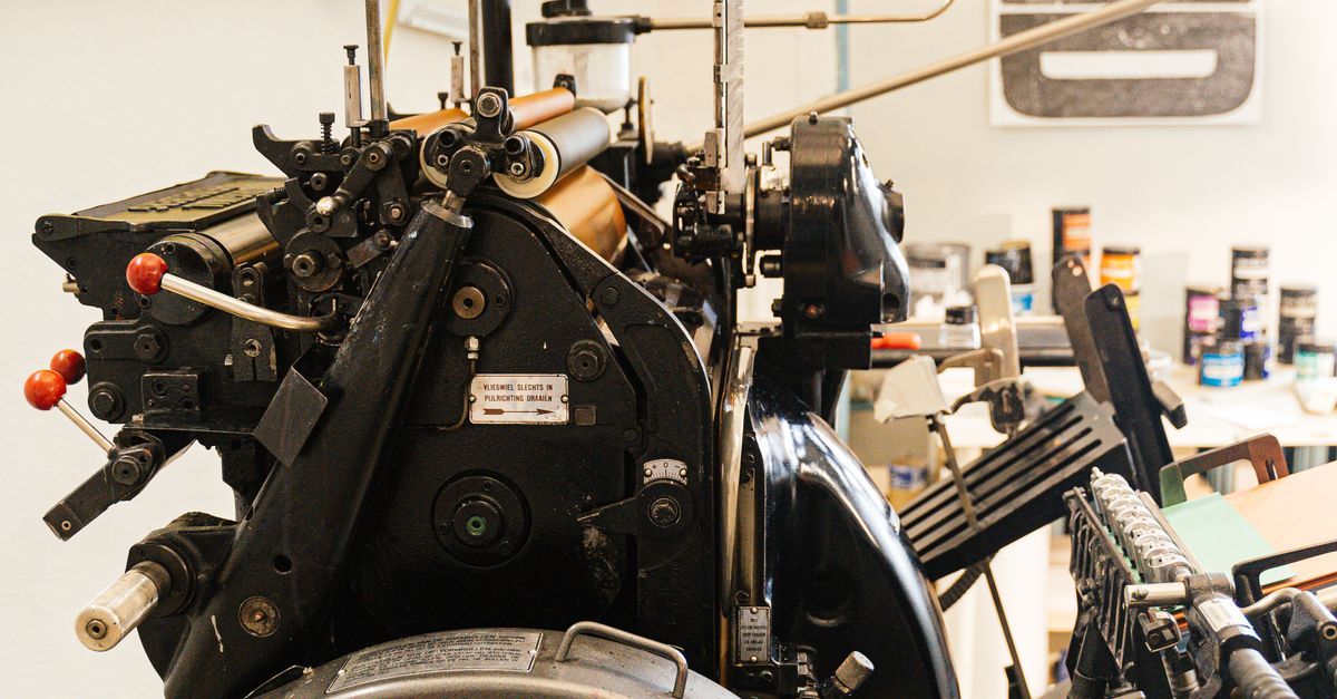 Complex Press Complex Press in a Graphic Design Studio · Free Stock Photo