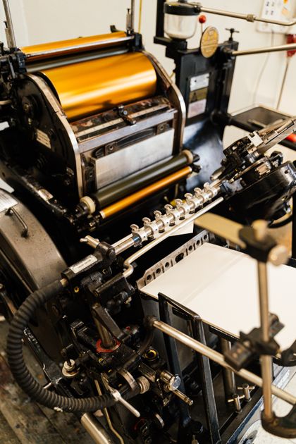 Inked rollers on a platen press — AI25.Studio on Pexels