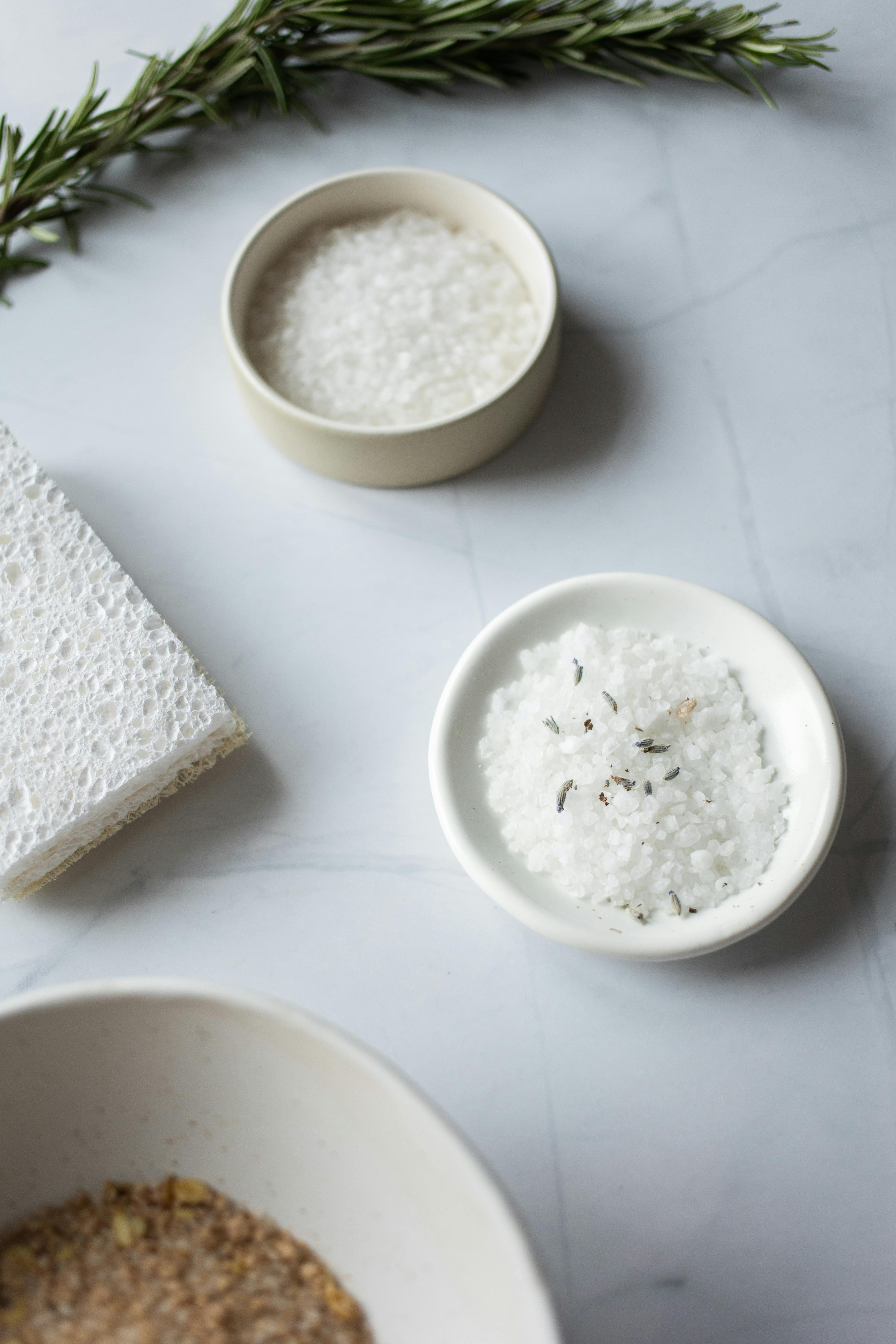 ingredients of natural scrub with rice near fresh green branch