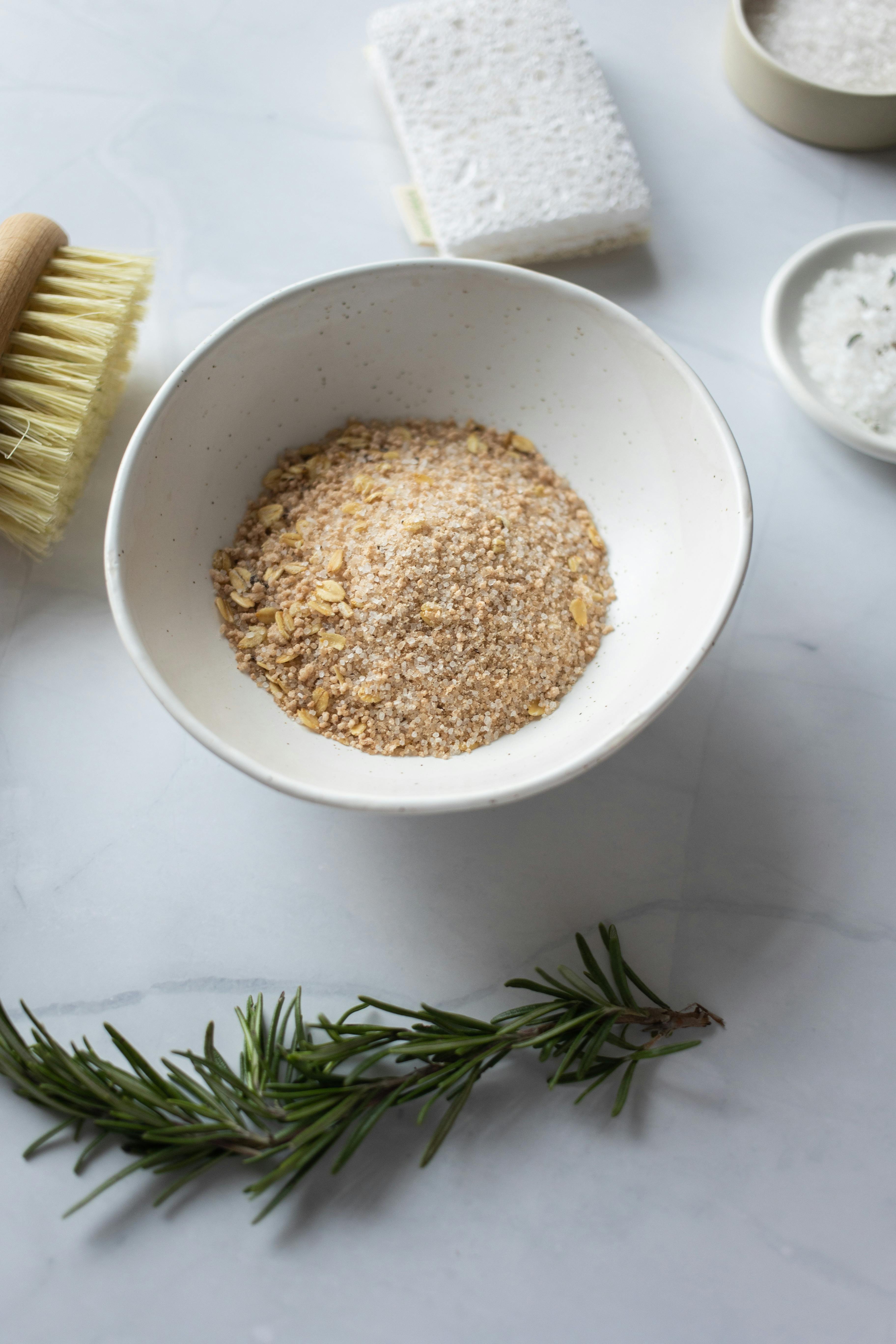 organic scrub in bowl near brush for dry massage