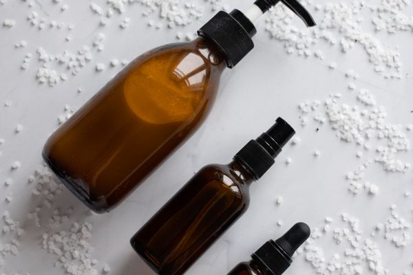 Dettaglio beauty caldo con pelle luminosa e texture cosmetiche Dettaglio beauty caldo con pelle luminosa e texture cosmetiche