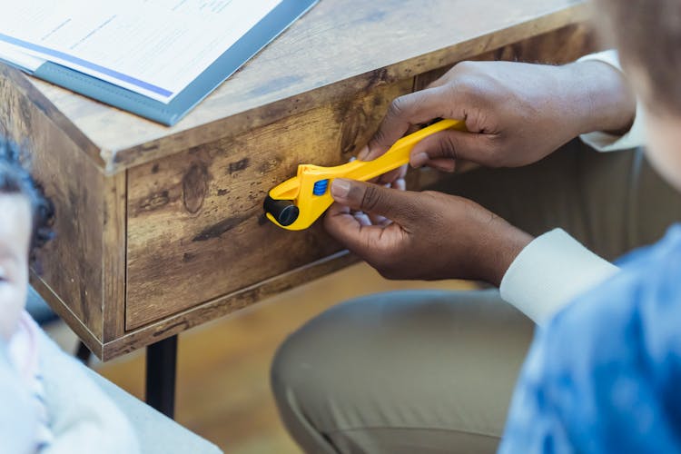 Crop Black Father With Adjustable Wrench