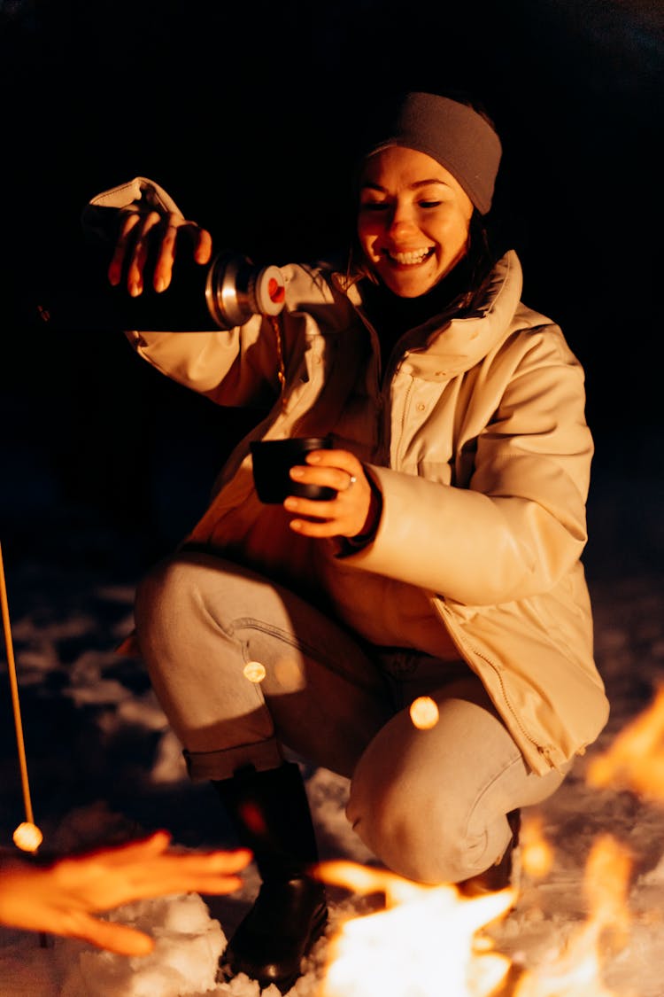 Pretty Woman Having Coffee On The Campsite