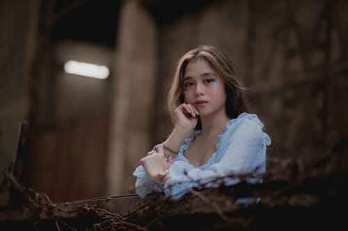 Photo of a Woman in Blue Dress