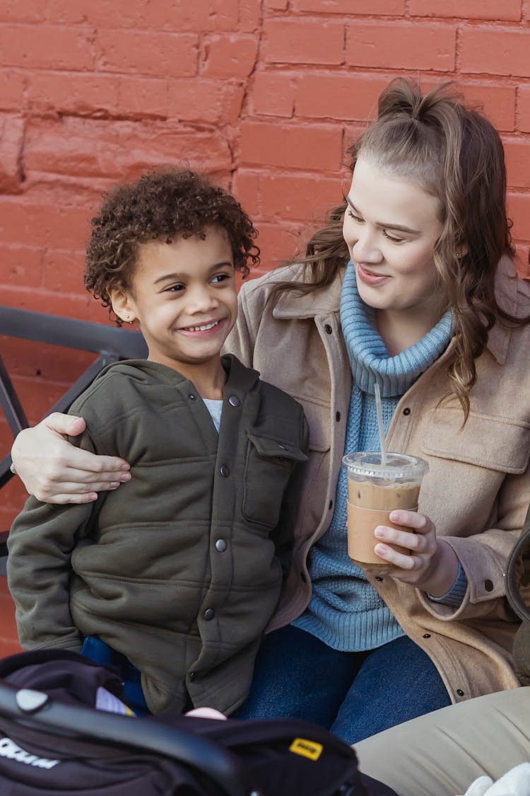 Cheerful Mother With Black Son On Street