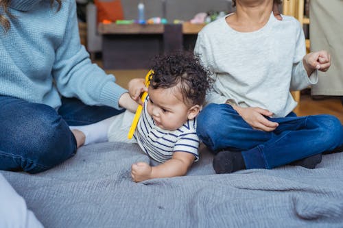 Foto profissional grátis de adorável, bebê, bebê afro-americano