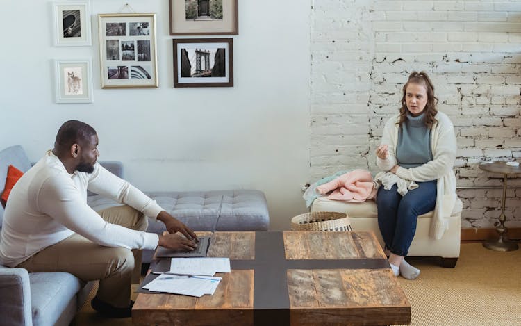 Wife And Husband Having Serious Conversation