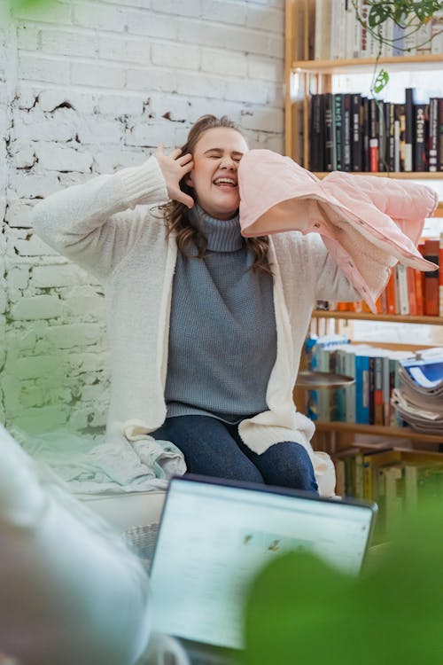Free Upset female in nervous rush shouting and touching head having desire misunderstand coming to end Stock Photo