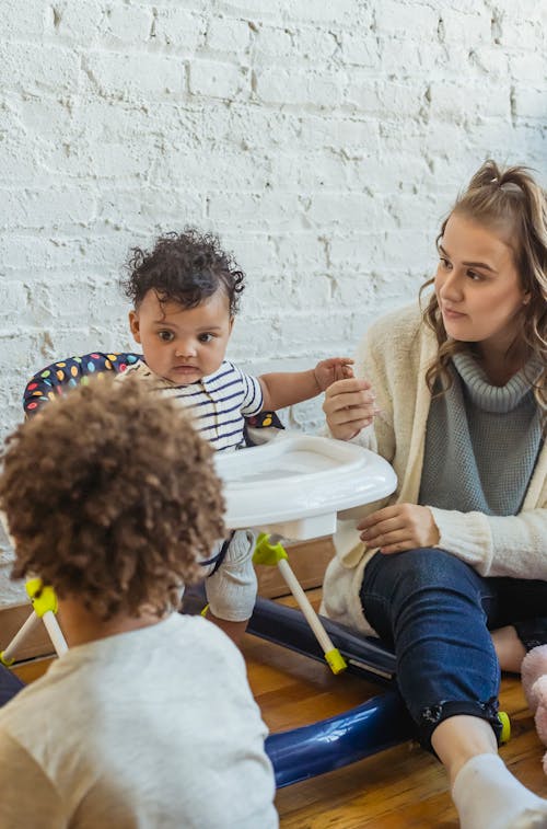 Free Caring mother with black children Stock Photo