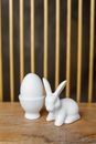 Porcelain Rabbit Sculpture on Wooden Surface