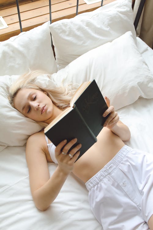 Free Beautiful Woman Reading a Book Stock Photo
