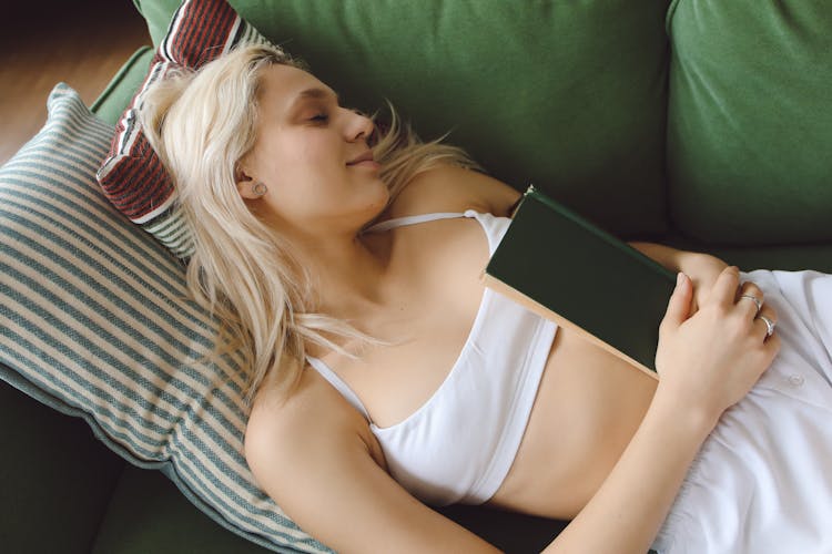 Woman Sleeping On A Sofa