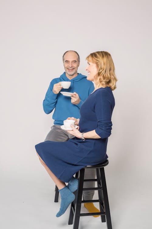 Free Couple Holding Cup of Coffee Stock Photo