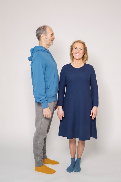 Free Man in Blue Jacket Beside Woman in Blue Shirt Stock Photo