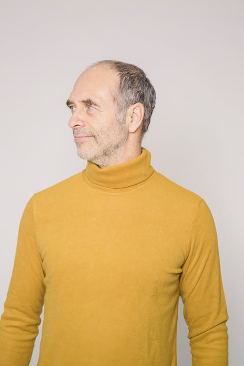 Man in Yellow Turtleneck Sweater