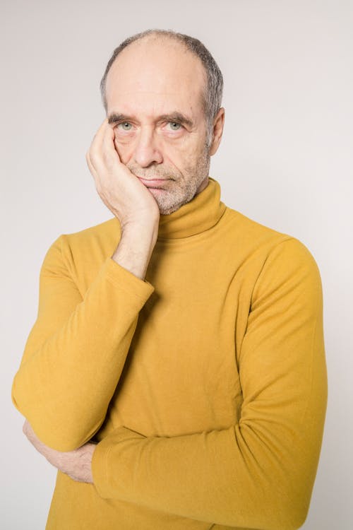 Man in Yellow Turtleneck Sweater