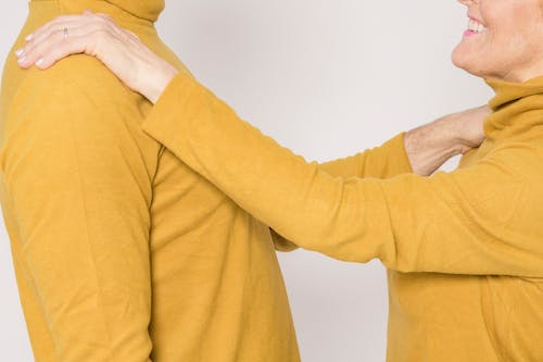 Person in Yellow Long Sleeve Shirt